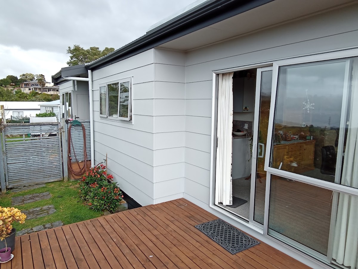 Freshly painted exterior with a new timber deck